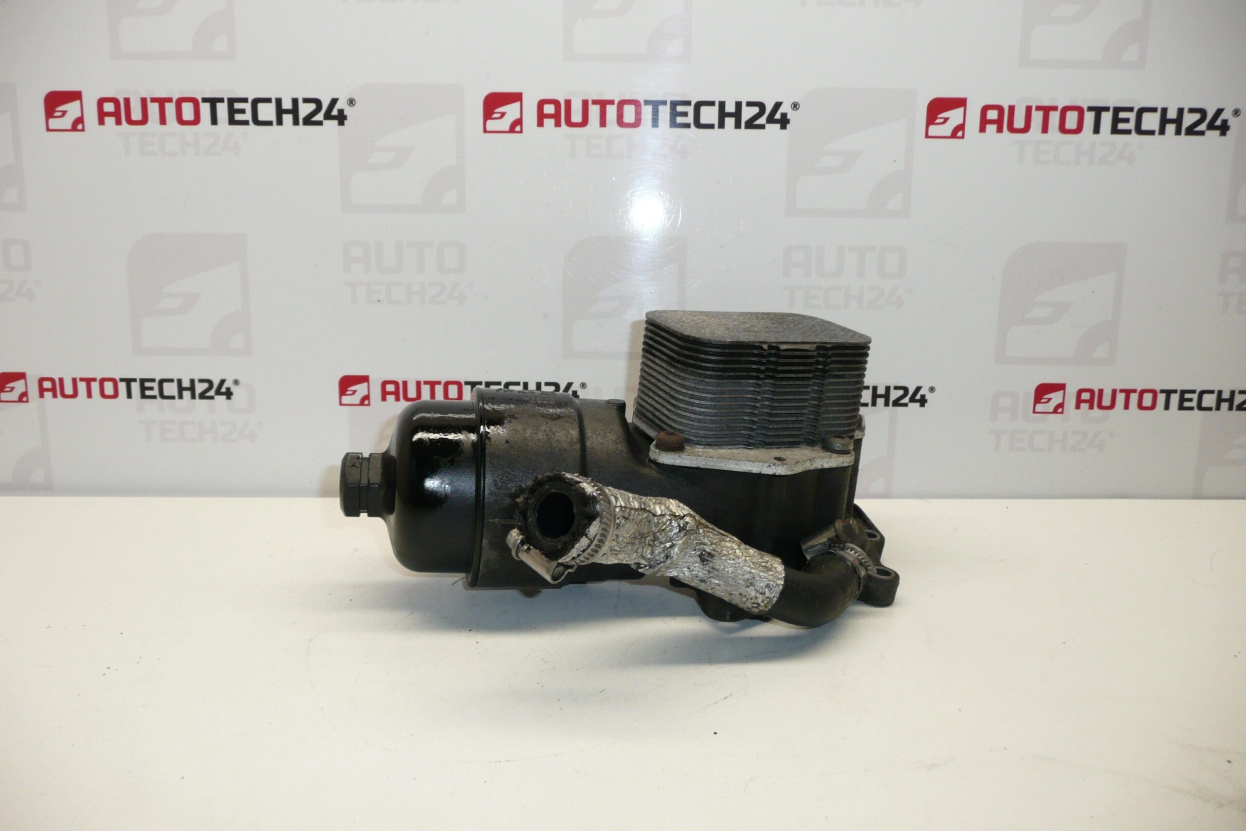 Обменник масло-вода 1.6 HDI 9656970080